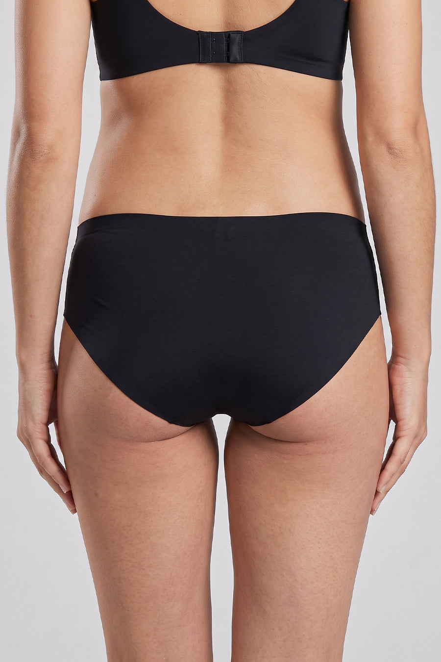 Black seamless maternity panties back view with full rear coverage