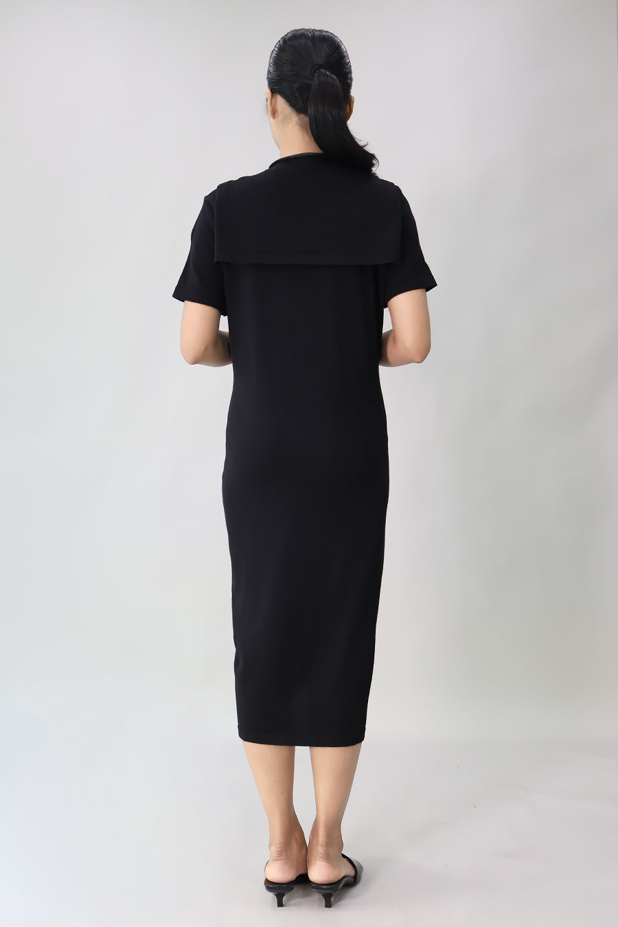 Black knit maternity midi dress with detachable scarf back view