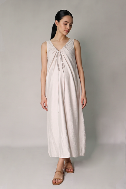 Beige sleeveless maternity maxi dress with ruched drawstring neckline